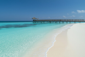 Fototapeta premium light wooden jetty on a beautiful clear turquoise ocean on a beach in the Maldives, wallpaper, generative AI