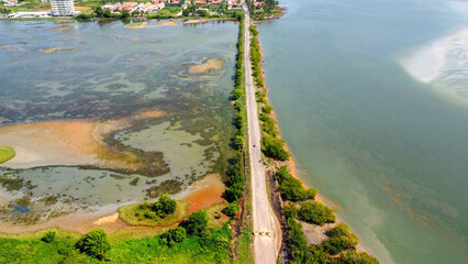 Top Wide angle view Of a road by the ocean