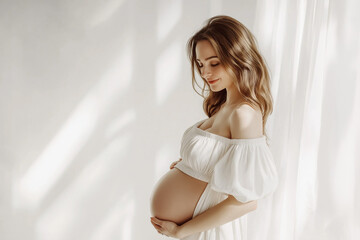 Fototapeta premium young beautiful happy pregnant woman touching her belly in a white room, generative AI
