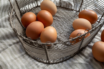 Organic brown chicken eggs from free-range organic farm in basket
