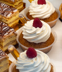 French cuisine, fresh baked baba au rum strawberry cake with chantilly cream, sweet dessert with rum