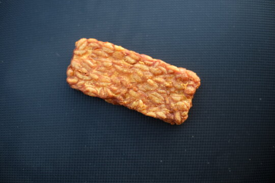 Traditional indonesian culinary food. Tempe Goreng Indonesia Food that is simple and often made at home. Indonesian Street Food. Tempe goreng or fried tempe.