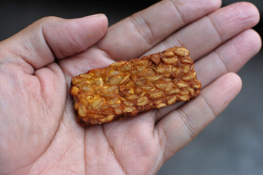 Traditional indonesian culinary food. Tempe Goreng Indonesia Food that is simple and often made at home. Indonesian Street Food. Tempe goreng or fried tempe.