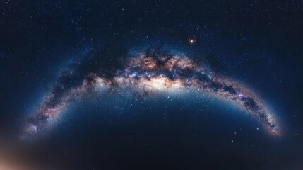 A stunning view of the Milky Way galaxy, with its swirling arms of gas and dust, against a backdrop of a dark night sky with countless stars.
