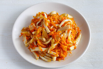 Korean food Stir-fried Squid, Squid stir-fried with onions, carrots in a spicy sauce