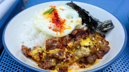 Garlic Butter Karaage on a plate, Japanese deep fried chicken with garlic and buuter seasoning