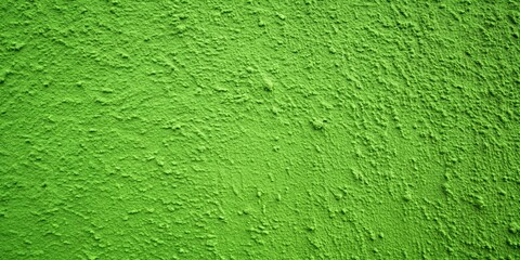 Close up shot of a textured green concrete wall with scuffs, perfect for background use