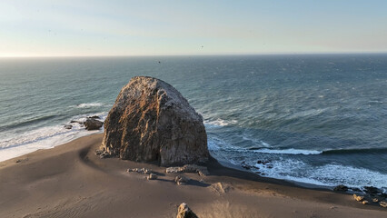 Large rocks natural monument Piedra de Iglecias Church stone on Chilean coast in Constitucion in...