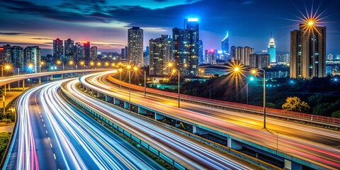 Fototapeta premium Highway lights illuminating cityscape with streaks of traffic at night, long exposure photography