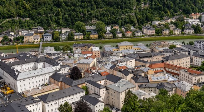 A view from Hohensalzburg Fortress in Salzburg, Austria - looking across a section of the Old Town, over the Salach river, to the Giselakai promenade at the base of the Capuchin Monastery hill.
