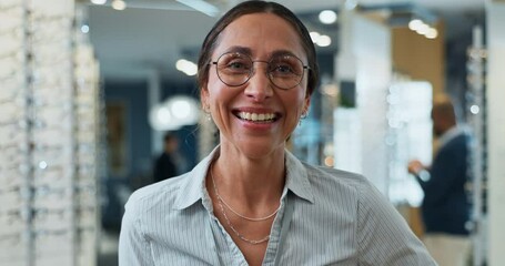 Optometrist, face and woman with glasses for optometry store of lens prescription, vision solution and eye care. Happy, person and portrait with medical eyewear, frame decision and wellness service