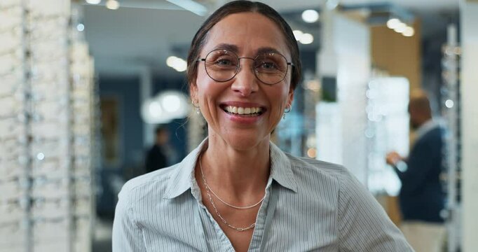 Optometrist, face and woman with glasses for optometry store of lens prescription, vision solution and eye care. Happy, person and portrait with medical eyewear, frame decision and wellness service