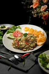 This is fried rice with green chili sauce typical of Indonesian food
