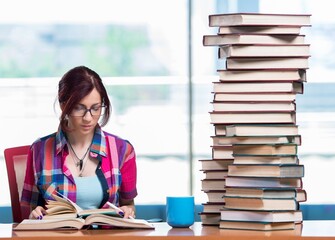 Young female student preparing for exams