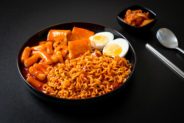 Korean instant noodles with Korean rice cake and fish cake and boiled egg