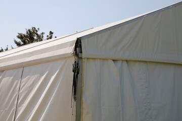 Canopy type sun and rain shield for temporary protection