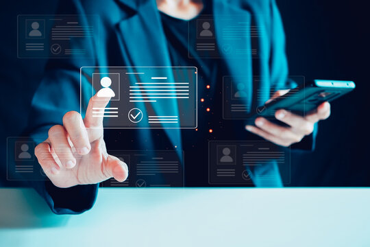 Digital identification or digital ID concept. Businessman use laptop and hand touch virtual screen of digital identification card to accessing databases by digital identity for cyber security.