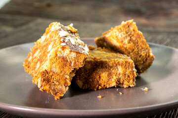 Tasty candies sweet cake anthill on a black background. Dessert. food concept