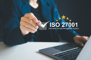 ISO 27001 concept. Businesswoman with ISO 27001 certified for information security management system (ISMS). requirements, certification, management, standards	
