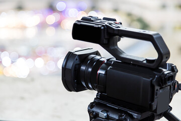 Video camera with blur background for journalist interview broadcasting reporter news or press conference speaker or public speaking or meeting report record and content creator live media concepts.
