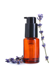Bottle of lavender essential oil and flowers on white background, closeup