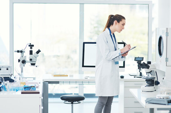 Writing, woman or report for science study, scientist in lab for research to test experiment for scientific innovation. Biotechnology, physicist or checklist for mpox vaccine development breakthrough