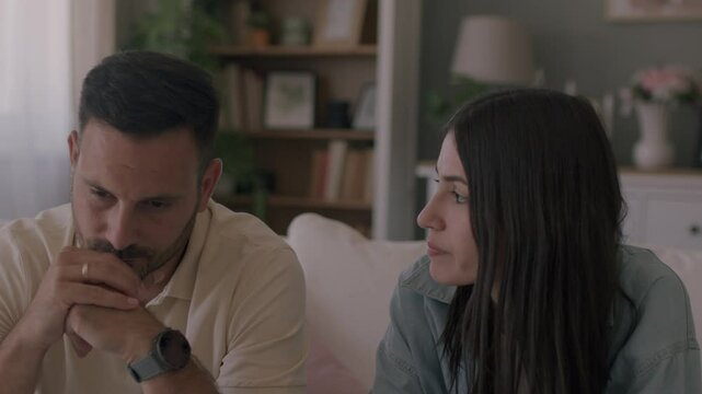 Mid aged couple having a counseling session with a therapist at home. 4K video