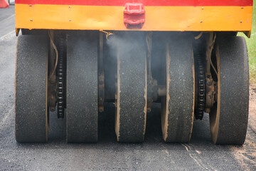 Road construction vehicles are working.