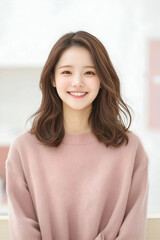 Portrait of a Smiling Young Professional Woman at Work in an Office Environment