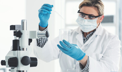 Fototapeta premium Woman, scientist and dropper with liquid in lab of microscope, chemical experiment or monkeypox process. Researcher, chemistry and biotech for investigation analysis, Denmark study and medical cure