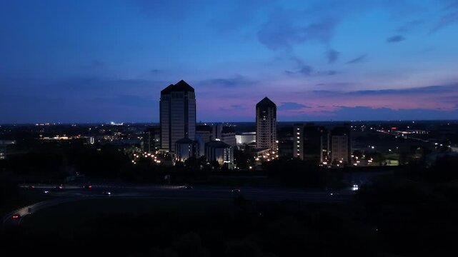 White Towers building in Vimercate city at sunset, Italy. Aerial forward and copy space