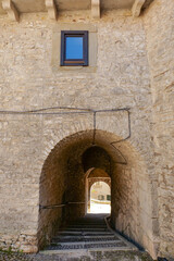 A street between old houses in Vastogirardi, a village in Molise in Italy.