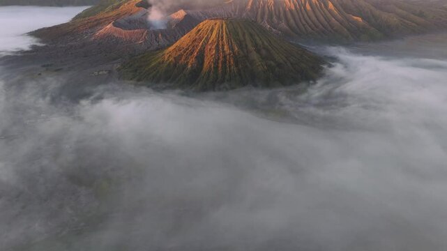 Drone shot reveals Mts. Bromo, Batok, Semeru, Jambangan, and Widodaren in the Tengger Caldera in Bromo Tengger Semeru National Park
