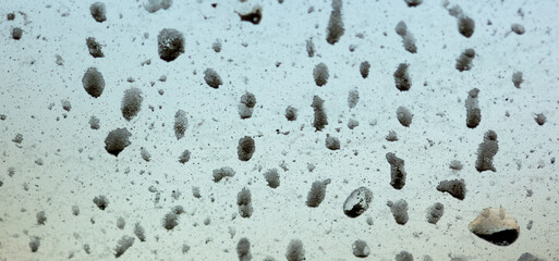 Dirt on the car glass. Abstract background