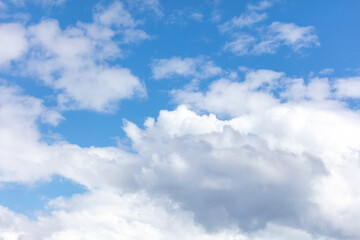 White clouds against a blue sky
