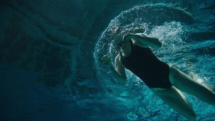 Bottom view of a female swimmer
