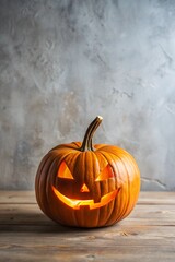 a carved pumpkin, commonly known as a jack-o'-lantern, sitting on a wooden surface. The pumpkin has a classic Halloween face carved into it, with triangular eyes, a triangular nose