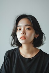 Portrait of a Young Asian Woman with Short Black Hair