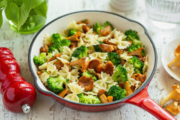 farfalle pasta with chanterelle mushrooms and  broccoli