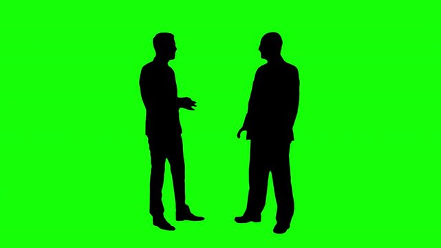 Black silhouette two businessman interacting with each other against and considerate handshake on green background. Green screen for compositing and presentation.