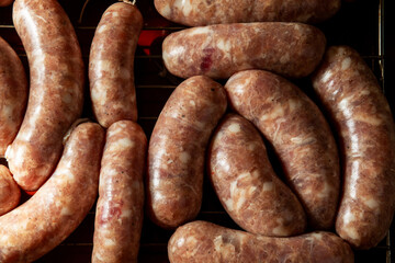 Concept of making homemade grilled sausages.