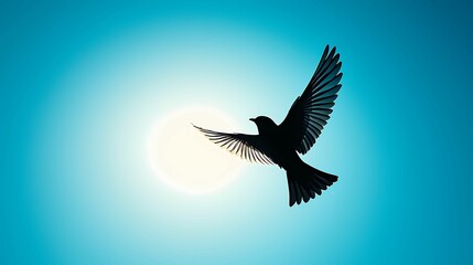 Fototapeta premium A silhouette of a bird soaring against a bright sun, showcasing freedom and tranquility in nature's vibrant sky.