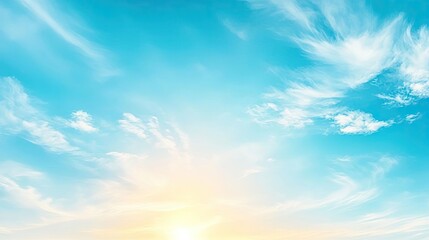A beautiful blue sky with wispy clouds and a bright sun illuminating the tranquil atmosphere.