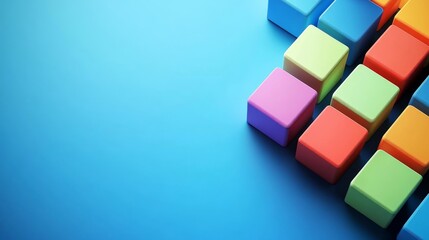 Obraz premium Colorful blocks arranged in a diagonal pattern against a blue background.