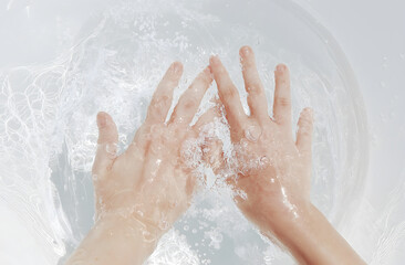 Close-Up of Hands Being Washed in Sink with Clear Water