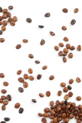 Naklejka premium A scattered arrangement of various coffee beans on a white background, showcasing different shades and textures of roasted coffee.