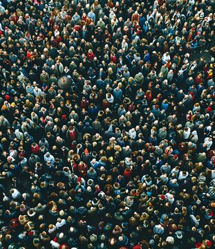 Large Crowd of People in an Open Space Seen from Above