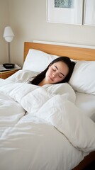 Woman Sleeping in Bed with White Bedding