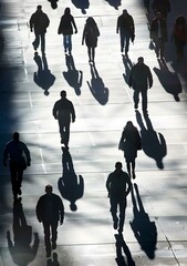 Silhouettes of People Walking on a City Street