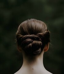 Naklejka premium Woman with Long Brown Hair in a Bun